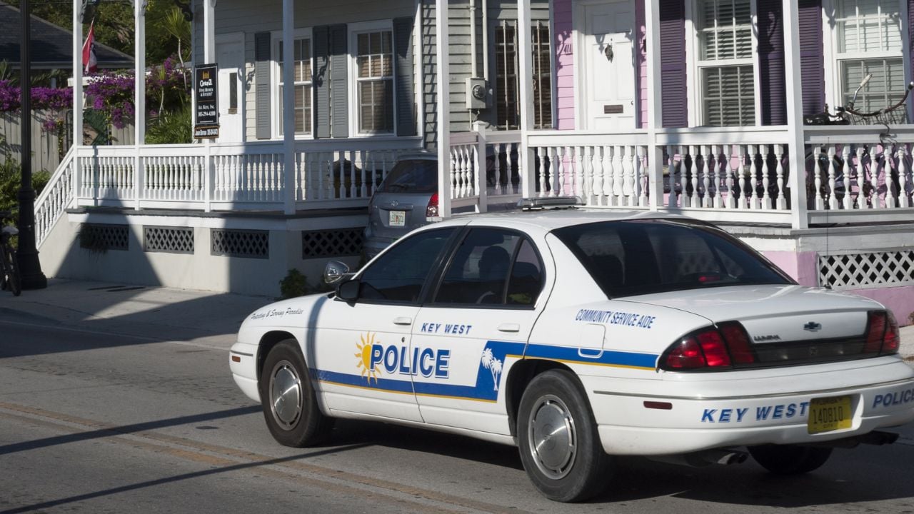 police car outside suburban house