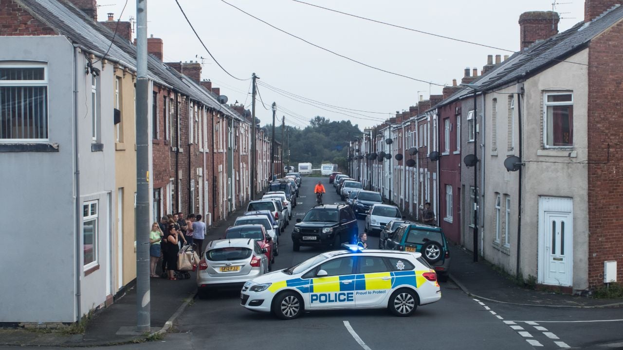 police search residential neighborhood