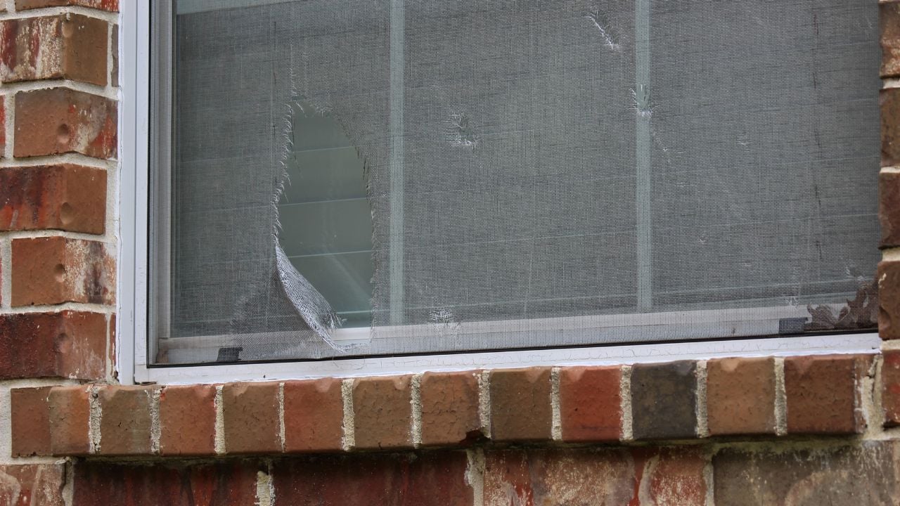 damaged window screen at a home
