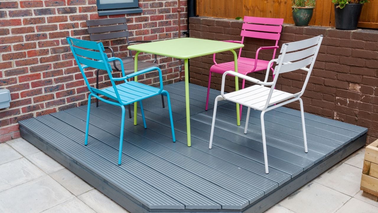 backyard patio with planters and furniture