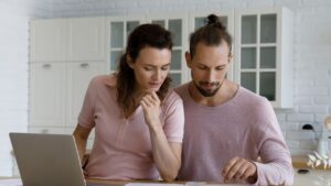 homeowners reviewing property tax assessment