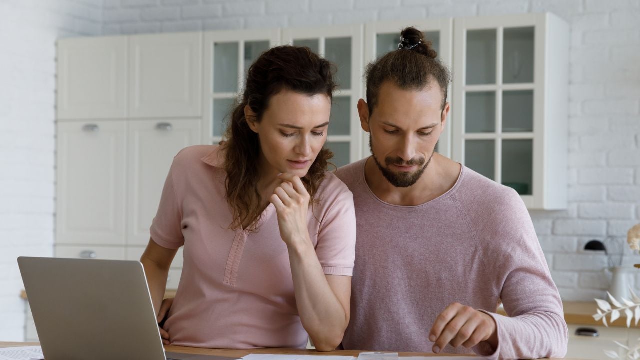 homeowners reviewing property tax assessment