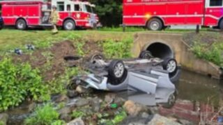 a vehicle overturned into a river