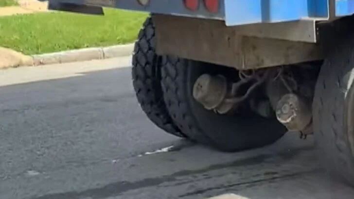 A Resident Says Foul-Smelling Liquid From Trash Trucks Has Stained Her Street for Six Weeks
