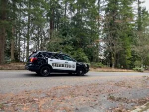 Sheriff patrol vehicle on a rural road