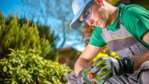 Water Supply Controller in Hand of Professional Garden Technician.