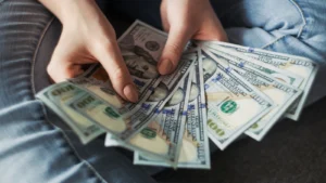 Woman counts out money