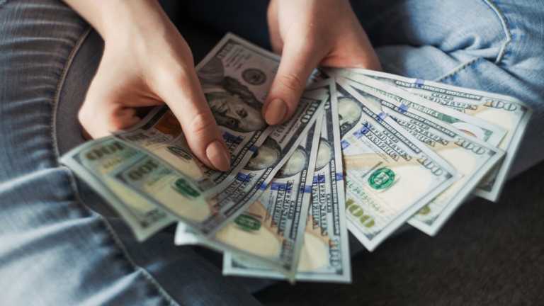 Woman counts out money