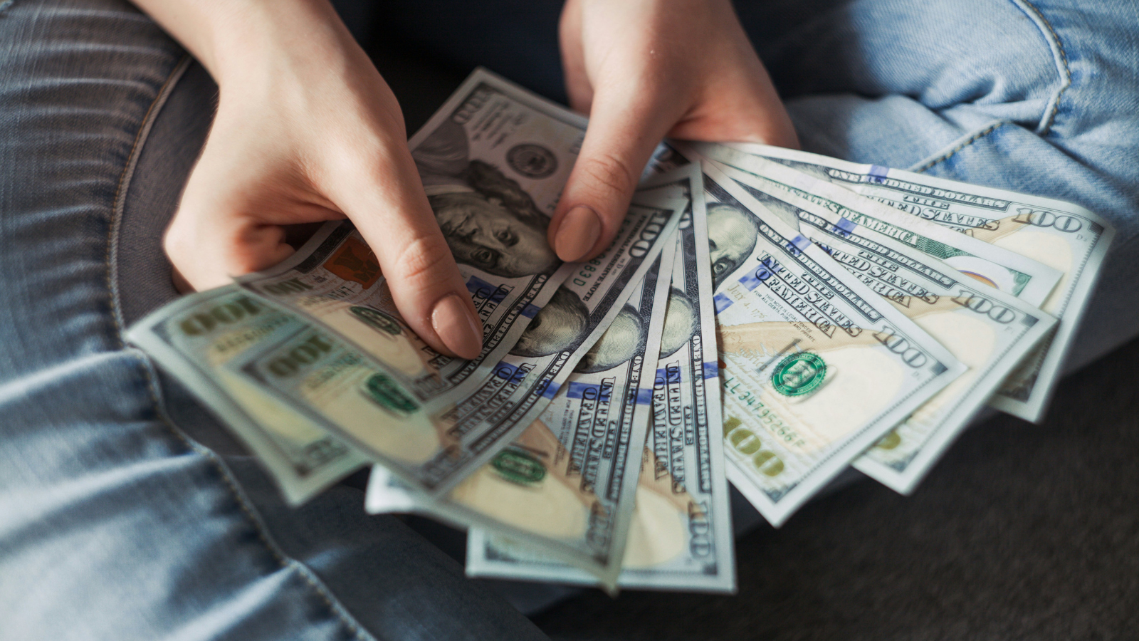 Woman counts out money