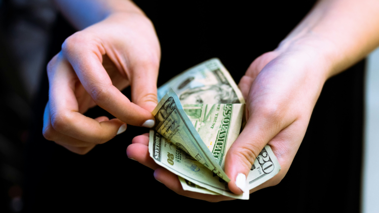 Hands Counting Money