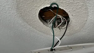 Electrician Says Previous Homeowner Left a Troubling Surprise Above the Ceiling