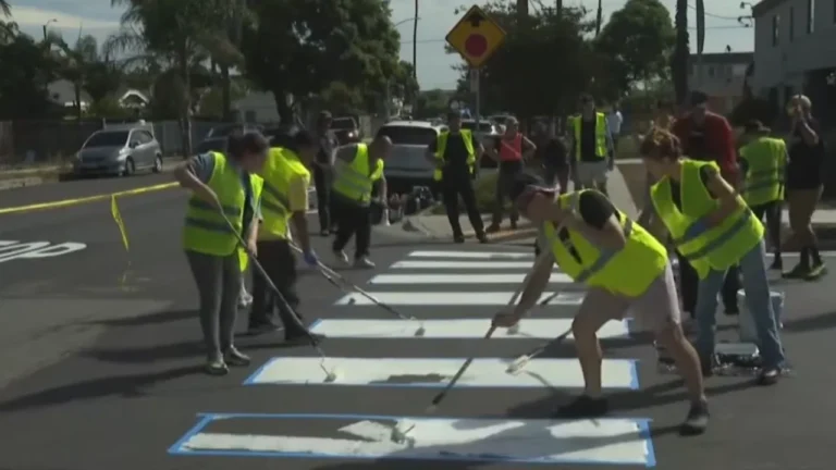 Los angeles residents paint their own crosswalk in protest.