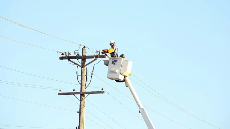 Garbage truck vs powerlines.