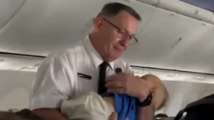Qantas Flight Attendant Goes Viral After Rocking Passenger’s Baby to Sleep