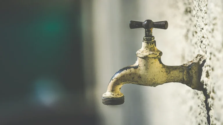stock image water faucet.