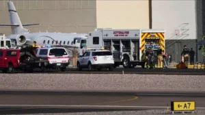 Car Smashes Through Airport Gate, Hits Plane Before Two Flee on Foot